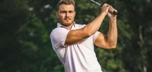image of man golfing
