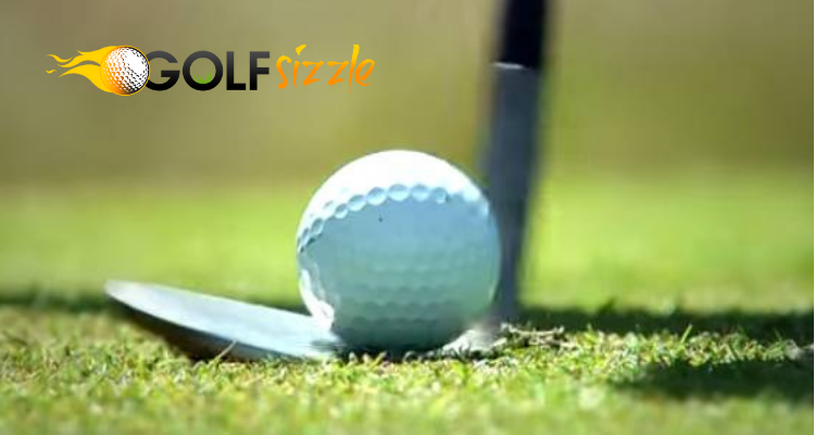 image of a golf club and ball